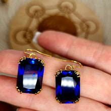 Load image into Gallery viewer, Beautiful Blue Sapphire Earrings dangle vintage style 24K. Large stone earrings. Blue stone Corundum earrings. Throat chakra jewelry.