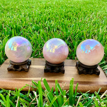 Load image into Gallery viewer, Angel Aura Rose Quartz Sphere. Large Healing Metaphysical Crystal with handmade wooden Base. Home Decor Crystals Meditation Reiki, Wicca
